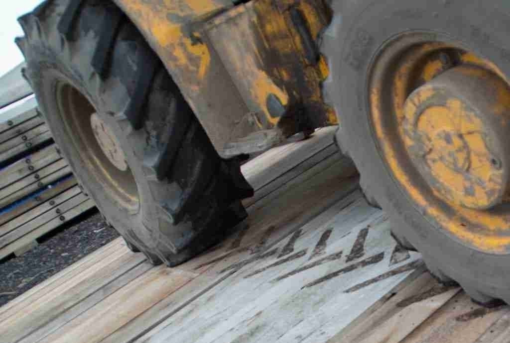 Non slip solution for tires of heavy vehicles using wooden mats wooden mats provide the best Tire Traction